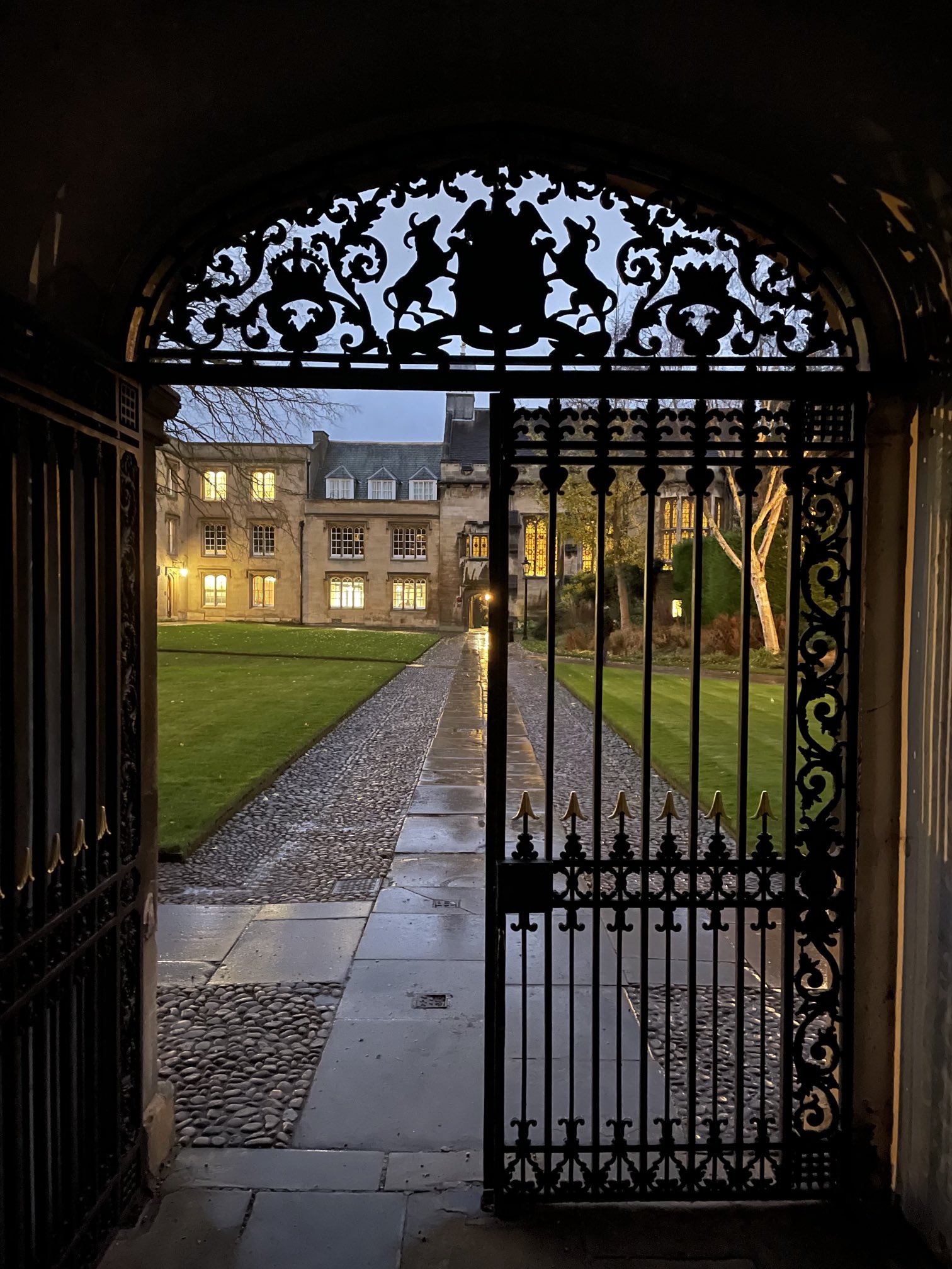 Second Court at dusk through the gate from the Fellows' Garden
